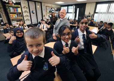 Year 6 pupils are pictured celebrating their Good Ofsted with headteacher Scott Brown and deputy headteacher Miss Pattison