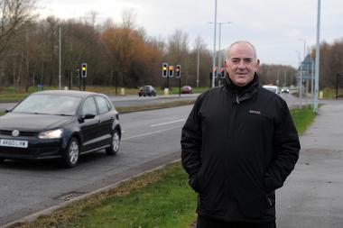 Councillor Ernest Gibson is pictured at one of the completed schemes on John Reid Road, South Shields.