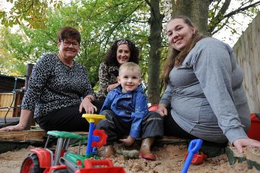 Cllr Jane Carter, is pictured with parent Sarah Minhinnett and son Sean with nursery manager Emma Hartley