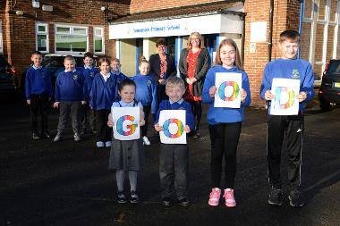 Cllr Jane Carter and headteacher Donna Scott are pictured with some of the pupils celebrating the ‘Good’ result.