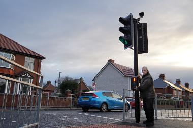 Councillor Ernest Gibson uses the new puffin crossing on Sunderland Road, South Shields.